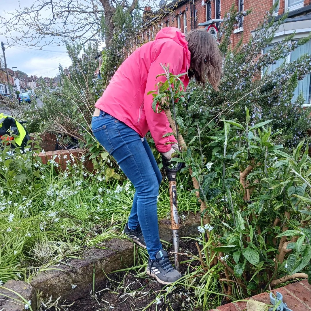 Volunteer digs in the community garden